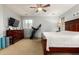This bedroom features carpet, neutral paint, and a ceiling fan, creating a cozy atmosphere at 5139 S Marble St, Gilbert, AZ 85298