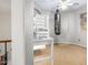 Upstairs bonus room with a punching bag and bright natural light at 5139 S Marble St, Gilbert, AZ 85298