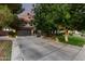 Beautiful two-story home with a tile roof and a spacious three-car garage at 5139 S Marble St, Gilbert, AZ 85298