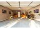 Spacious two-car garage with painted walls, storage, and epoxy flooring at 5139 S Marble St, Gilbert, AZ 85298