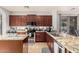 Spacious kitchen featuring granite countertops, stainless steel appliances, and abundant storage at 5139 S Marble St, Gilbert, AZ 85298