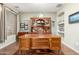 Home office featuring hardwood flooring, wooden desk, and wooden hutch for optimal organization at 5139 S Marble St, Gilbert, AZ 85298