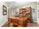 Home office featuring hardwood flooring, wooden desk, and wooden hutch for optimal organization at 5139 S Marble St, Gilbert, AZ 85298