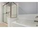 Bright bathroom showcases a soaking tub and glass-enclosed shower at 5550 N 16Th St # 166, Phoenix, AZ 85016