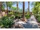 Beautiful community landscaping with mature trees and wrought iron fence, with walking path at 5550 N 16Th St # 166, Phoenix, AZ 85016