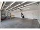 Spacious two-car garage offering ample storage space and a clean concrete floor at 592 W Harvard Ave, Gilbert, AZ 85233