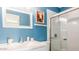 Modern bathroom with updated sink, vanity, and glass-enclosed shower at 6945 E Osborn Rd # B, Scottsdale, AZ 85251