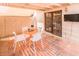 Charming outdoor patio with an orange table and comfortable seating, perfect for enjoying sunny days at 6945 E Osborn Rd # B, Scottsdale, AZ 85251