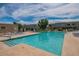 Large community swimming pool offering a refreshing escape on a sunny day at 6945 E Osborn Rd # B, Scottsdale, AZ 85251