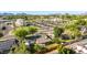 The aerial view captures the home, with a patio, shed and mature trees at 743 W Ocotillo Rd, Phoenix, AZ 85013