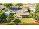 A covered patio and green lawn highlight the backyard's features in this aerial view at 743 W Ocotillo Rd, Phoenix, AZ 85013