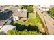 The backyard boasts a grassy area, patio, a grill, and fresh, vibrant landscaping at 743 W Ocotillo Rd, Phoenix, AZ 85013