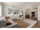 Cozy living room featuring a fireplace, comfortable seating, and stylish decor at 743 W Ocotillo Rd, Phoenix, AZ 85013