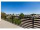 Balcony view showcasing the neighborhood with modern railings at 8038 E Clarendon Ave, Scottsdale, AZ 85251