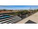 Rooftop deck boasting modern railing with views of pool and lush green landscaping at 8038 E Clarendon Ave, Scottsdale, AZ 85251
