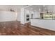 Open-concept living space flows seamlessly to a modern kitchen, creating the perfect entertaining area at 8315 E Vernon Ave, Scottsdale, AZ 85257