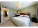 Carpeted bedroom with a queen-size bed and mirrored closet doors at 8532 E Sheridan St, Scottsdale, AZ 85257