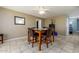 Inviting dining area with modern table set, tile floors, and natural light at 8532 E Sheridan St, Scottsdale, AZ 85257