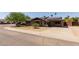 Charming single-story home with solar panels, mature landscaping, and a spacious driveway at 8532 E Sheridan St, Scottsdale, AZ 85257