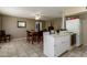 Traditional kitchen featuring tile flooring and a dining table with seating for four at 8532 E Sheridan St, Scottsdale, AZ 85257