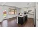 Modern kitchen featuring stainless appliances, granite counters, and a charming window at 9051 W Iona Way, Peoria, AZ 85383