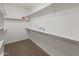 Spacious walk-in closet boasts ample shelving for optimal storage and organization at 9051 W Iona Way, Peoria, AZ 85383