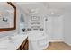 Bright bathroom showcasing a large soaking tub, a shower, and ample counter space at 941 E Stirrup Ln, San Tan Valley, AZ 85143