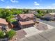 Beautiful two-story home with well-manicured landscaping and a three-car garage at 941 E Stirrup Ln, San Tan Valley, AZ 85143