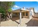 Backyard patio with covered structure attached to the house at 9839 W Utopia Rd, Peoria, AZ 85382
