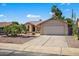 Charming single story home featuring a two car garage and mature desert landscaping at 9839 W Utopia Rd, Peoria, AZ 85382