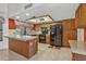 Kitchen featuring wooden cabinets, black appliances, tile floors and countertops at 9839 W Utopia Rd, Peoria, AZ 85382