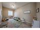 bedroom with playful decor, including a toy cars rug, fun wall art, and a ceiling fan at 10465 E Knowles Ave, Mesa, AZ 85209