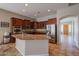 Well-equipped kitchen with stainless steel appliances, granite countertops, and ample cabinet space at 10465 E Knowles Ave, Mesa, AZ 85209