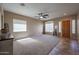 Bright and airy living room featuring neutral tones and plenty of natural light at 10465 E Knowles Ave, Mesa, AZ 85209