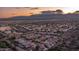 Aerial view of the neighborhood showing home location, mountain views and desert landscape at sunset at 1123 W Thunderhill Dr, Phoenix, AZ 85045