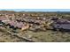 Community aerial showcasing desert landscaping with a partial view of a private pool, set against mountains at 1123 W Thunderhill Dr, Phoenix, AZ 85045