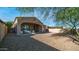 Relax on this covered patio complete with outdoor seating, with a zero-scaped backyard at 1123 W Thunderhill Dr, Phoenix, AZ 85045