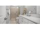 Bathroom features a glass shower enclosure and a modern vanity at 1123 W Thunderhill Dr, Phoenix, AZ 85045