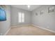 Bright bedroom with neutral walls, large window and carpeted floor at 1123 W Thunderhill Dr, Phoenix, AZ 85045