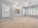 Light filled bedroom with large windows and neutral carpet at 1123 W Thunderhill Dr, Phoenix, AZ 85045