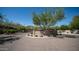 A desert community welcomes residents with a stone entrance and views of the surrounding mountains at 1123 W Thunderhill Dr, Phoenix, AZ 85045