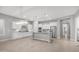 Spacious kitchen boasts white cabinets, granite countertops, and stainless steel appliances at 1123 W Thunderhill Dr, Phoenix, AZ 85045