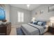 Main bedroom showcases stylish decor, including a modern bed, nightstands, and artwork at 1123 W Thunderhill Dr, Phoenix, AZ 85045
