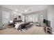 Serene main bedroom with a tufted headboard and ample natural light at 1123 W Thunderhill Dr, Phoenix, AZ 85045