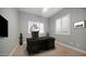 Office features a large desk, comfortable chair, and modern decor at 1123 W Thunderhill Dr, Phoenix, AZ 85045