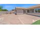 Outdoor patio with outdoor kitchen with built in grill, perfect for entertaining guests at 11306 E Rembrandt Ave, Mesa, AZ 85212