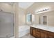 Spacious bathroom with a double vanity, soaking tub and walk-in shower at 11306 E Rembrandt Ave, Mesa, AZ 85212
