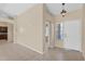 Bright entryway with tile floors and a view into the home's living spaces at 11306 E Rembrandt Ave, Mesa, AZ 85212