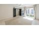 Bedroom featuring a ceiling fan, sliding door access to an outdoor patio, and a closet at 1131 N Cherry --, Mesa, AZ 85201