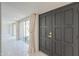 Welcoming entryway with black double doors and tiled flooring leading to bright living spaces at 1131 N Cherry --, Mesa, AZ 85201